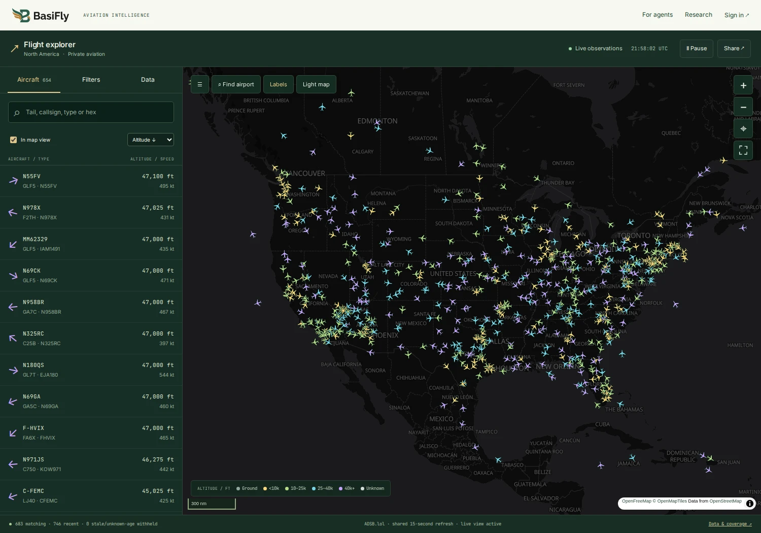 BasiFly flight explorer showing altitude-colored aircraft across North America alongside a searchable aircraft list